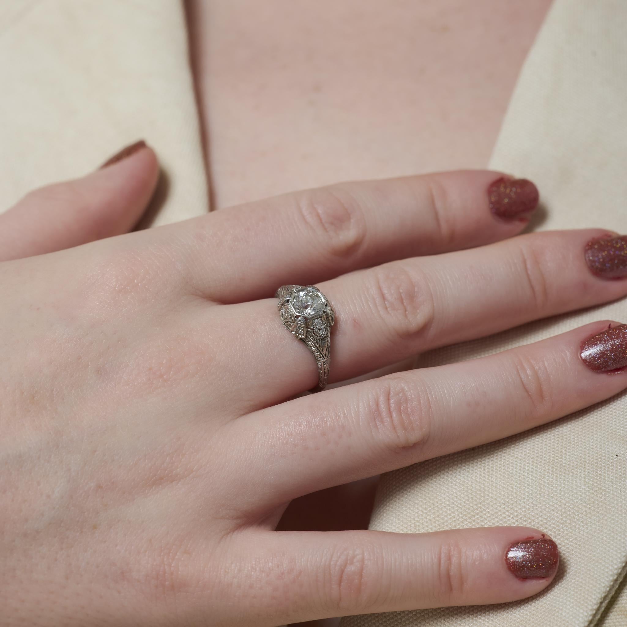 Art Deco diamond platinum bezel engagement ring