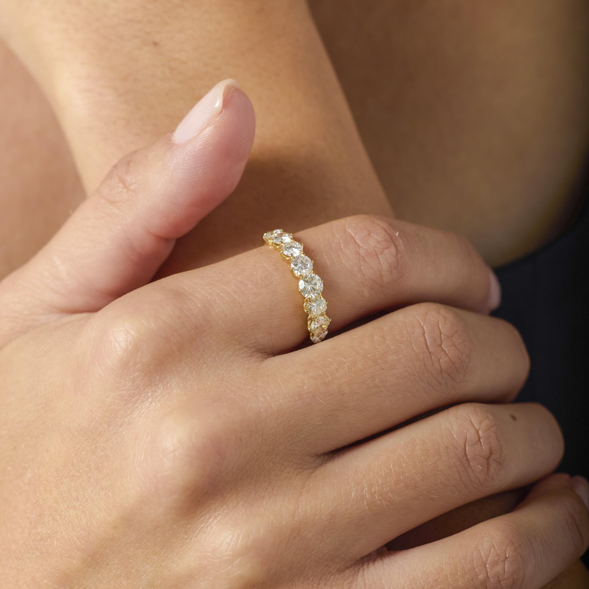 Modern 1.48 carat diamond 18k yellow gold half eternity band