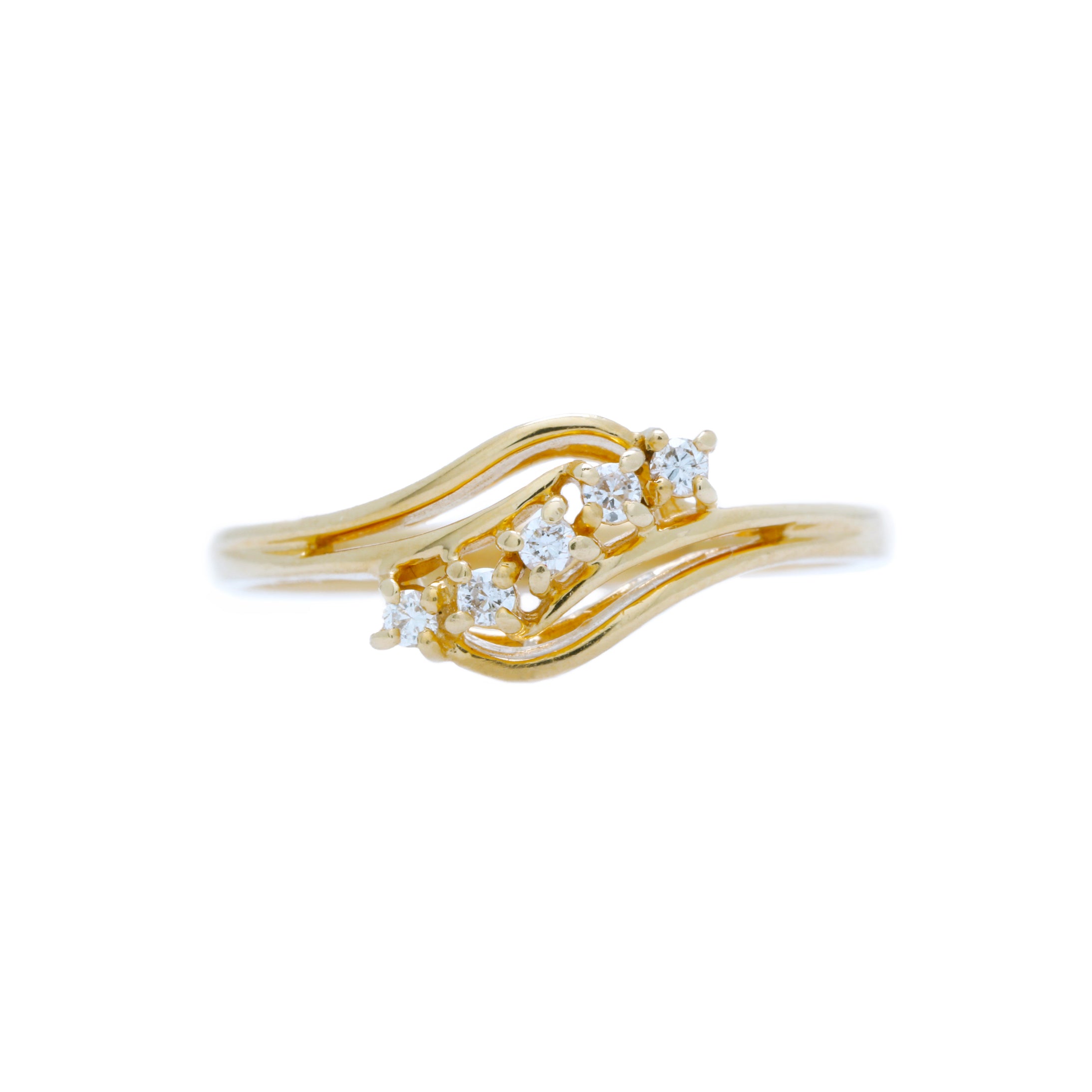 Casade A 1970's Whimsical 18 Karat Yellow Gold and Diamond Wave Ring