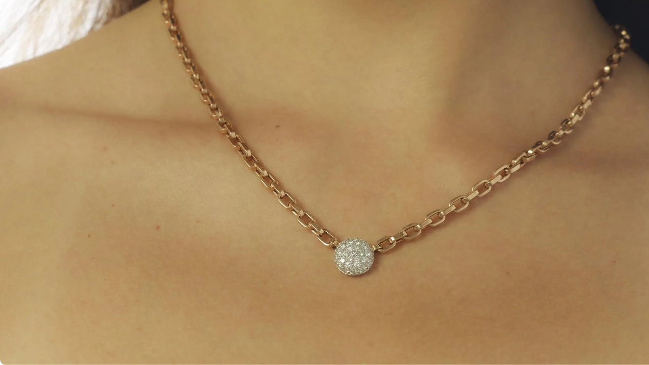 Close-up of vintage Italian platinum and rose gold chain with diamond pendant