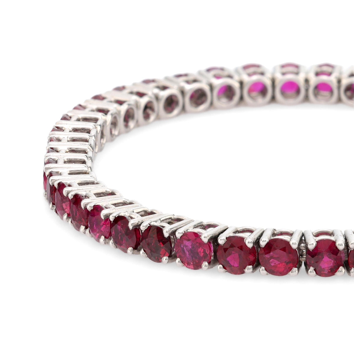 Puig Doria 15 carat total weight ruby 18k white gold tennis bracelet