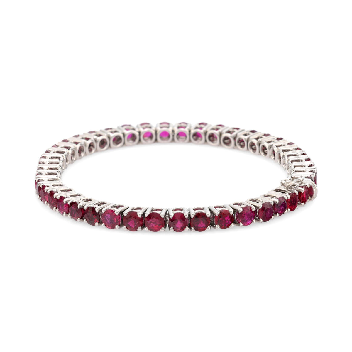 Puig Doria 15 carat total weight ruby 18k white gold tennis bracelet