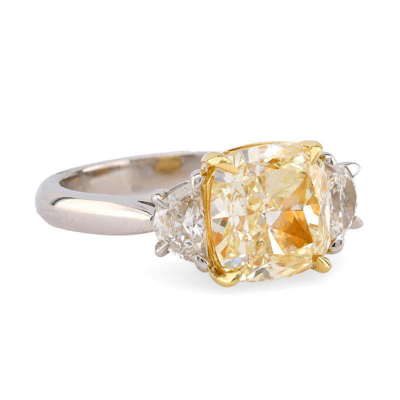 Modern 3.08 Carat EGL Fancy Yellow Diamond Platinum Three Stone Ring