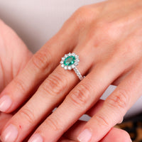 GIA 1 carat oval cut emerald diamond 18k white gold cluster ring