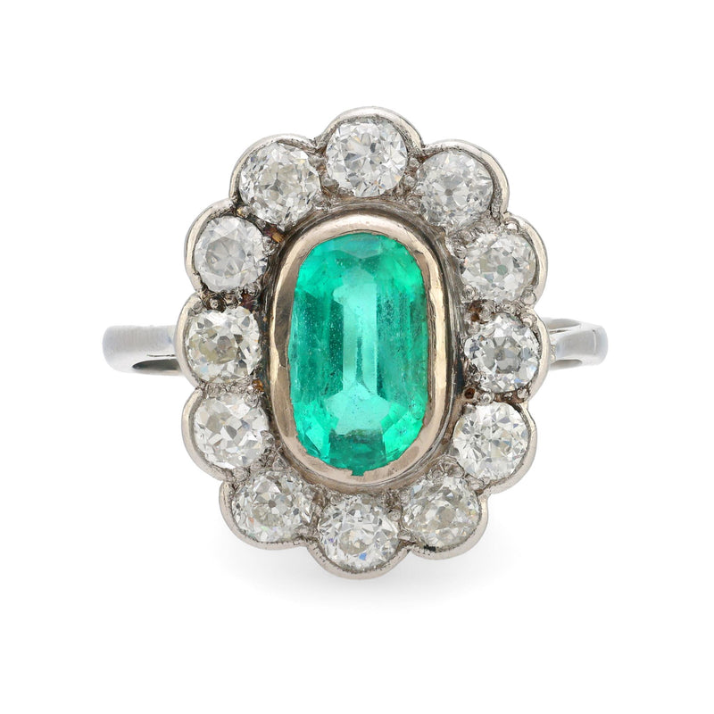 GIA 1.60 carat oval cut emerald diamond platinum cluster ring