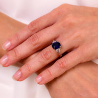 GIA 3.42 carat cushion cut sapphire diamond platinum three stone ring