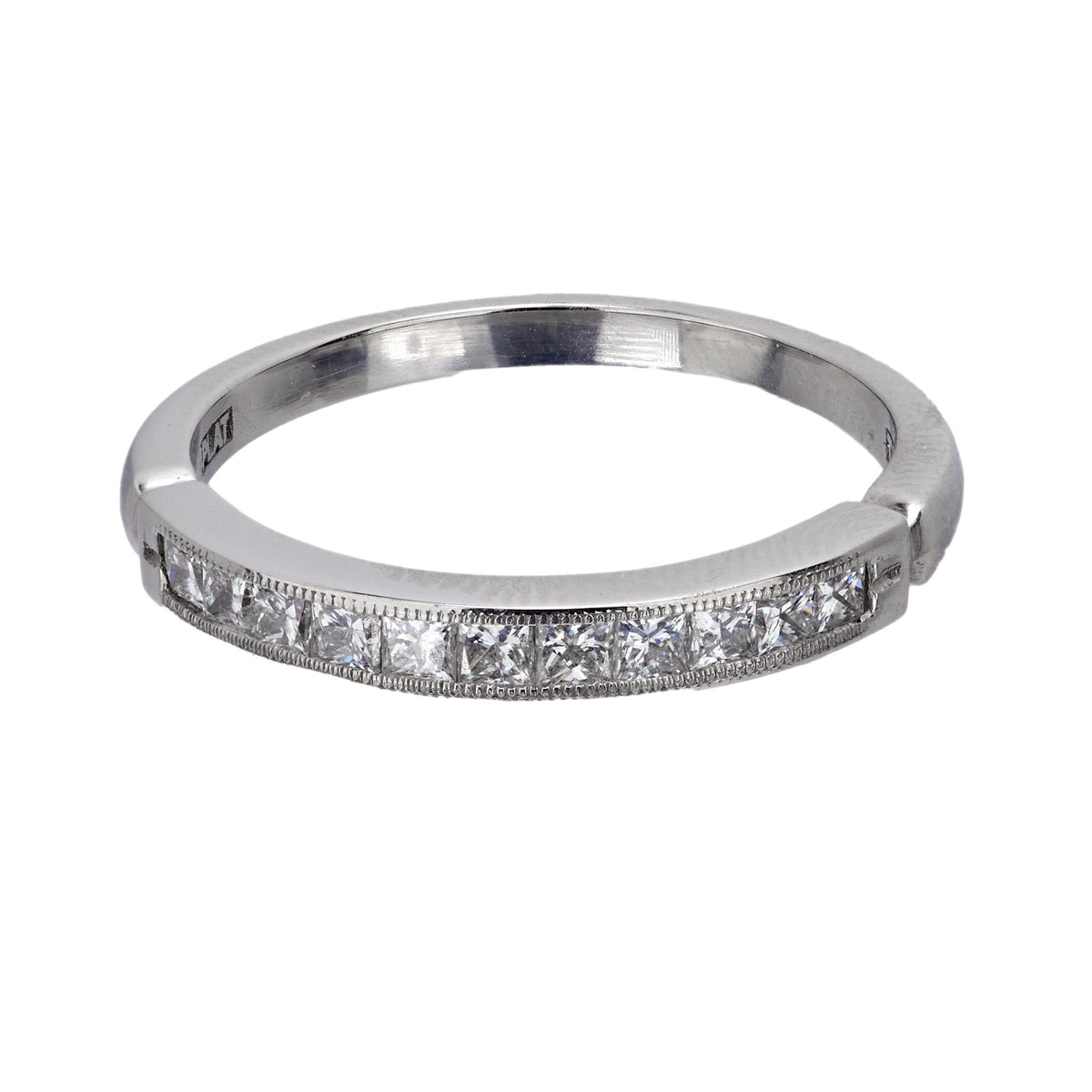 Contemporary princess cut diamond platinum wedding band