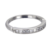 Contemporary princess cut diamond platinum wedding band