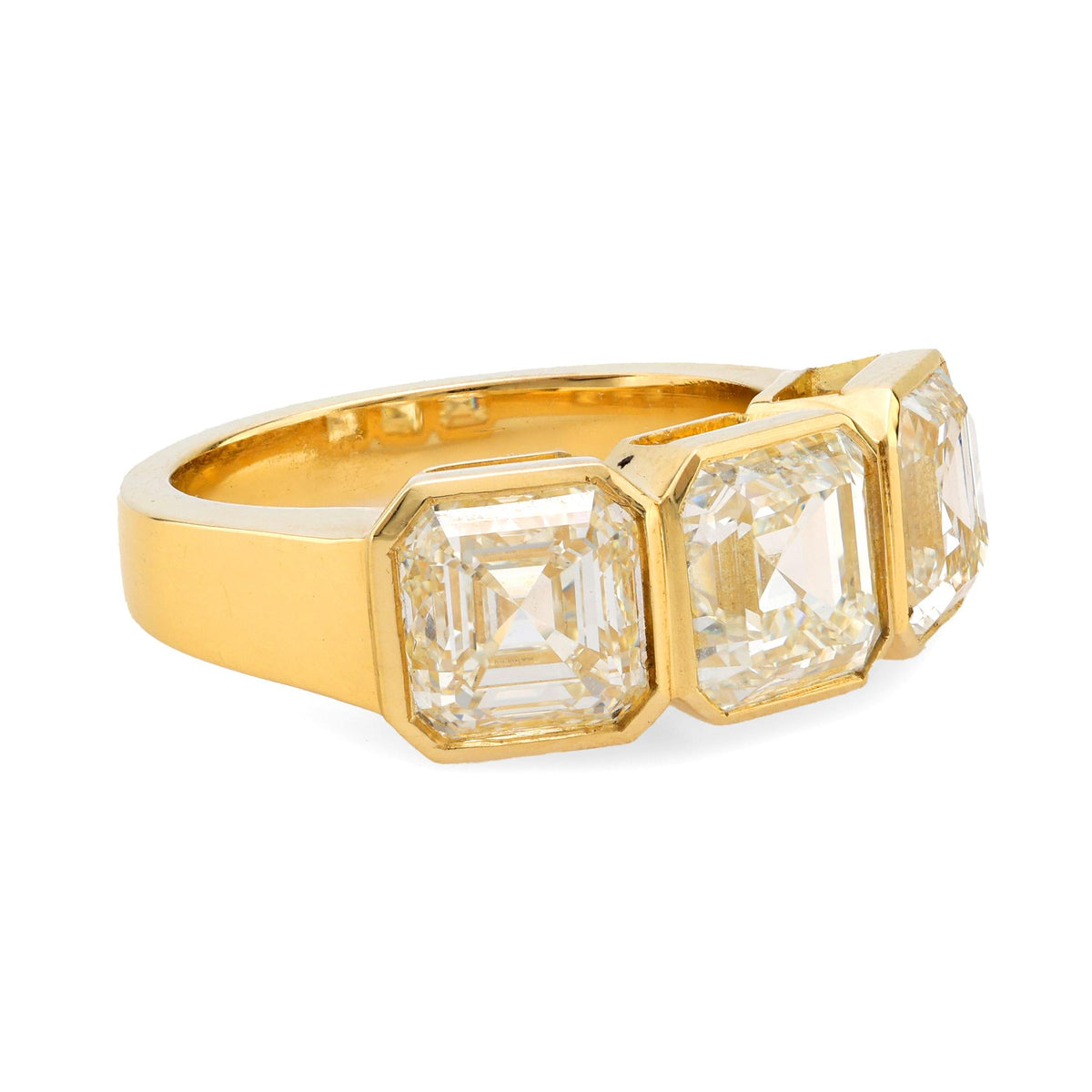 GIA 6.02 carat total weight Asscher cut diamond 18k yellow gold three stone ring