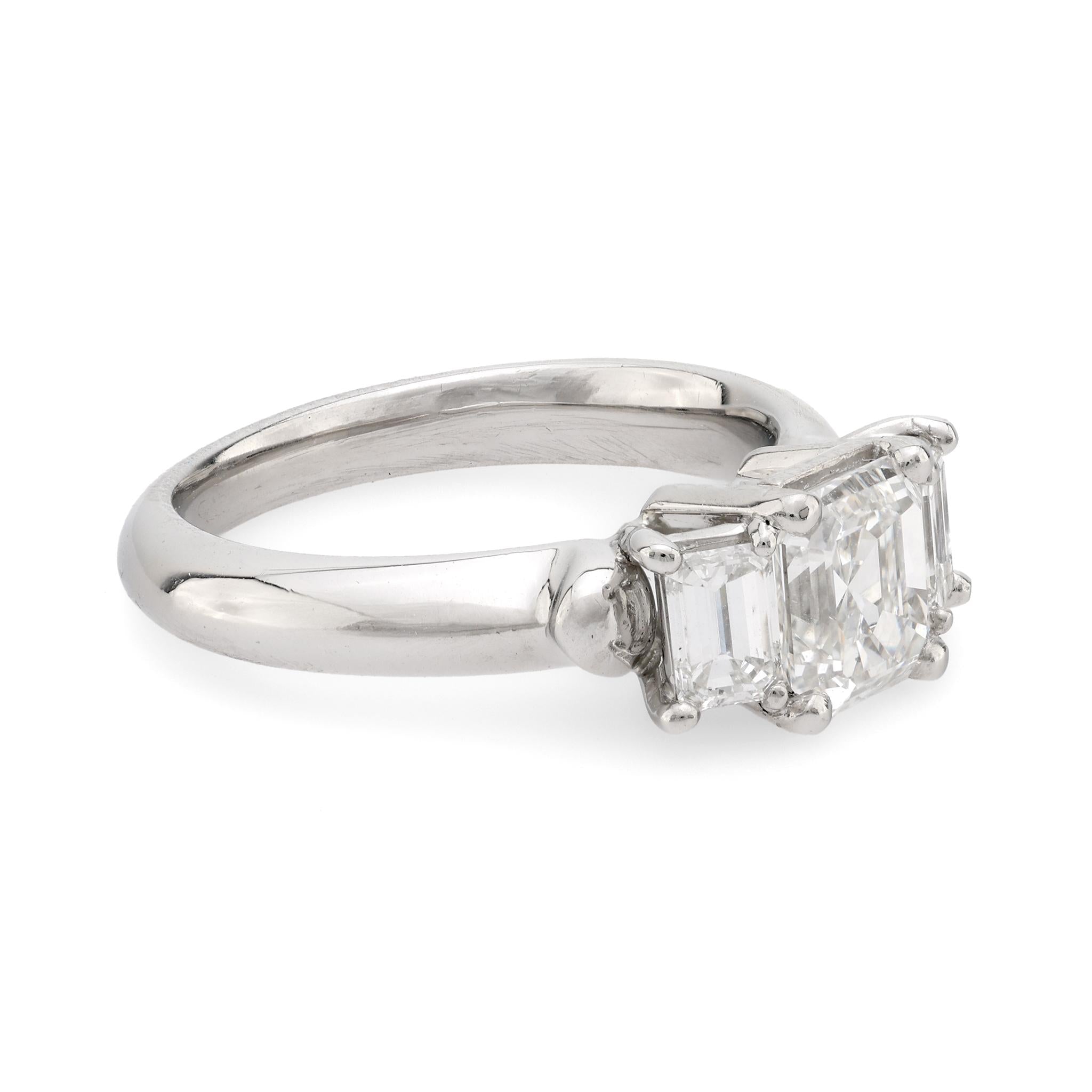 Vintage GIA emerald cut diamond platinum three stone ring