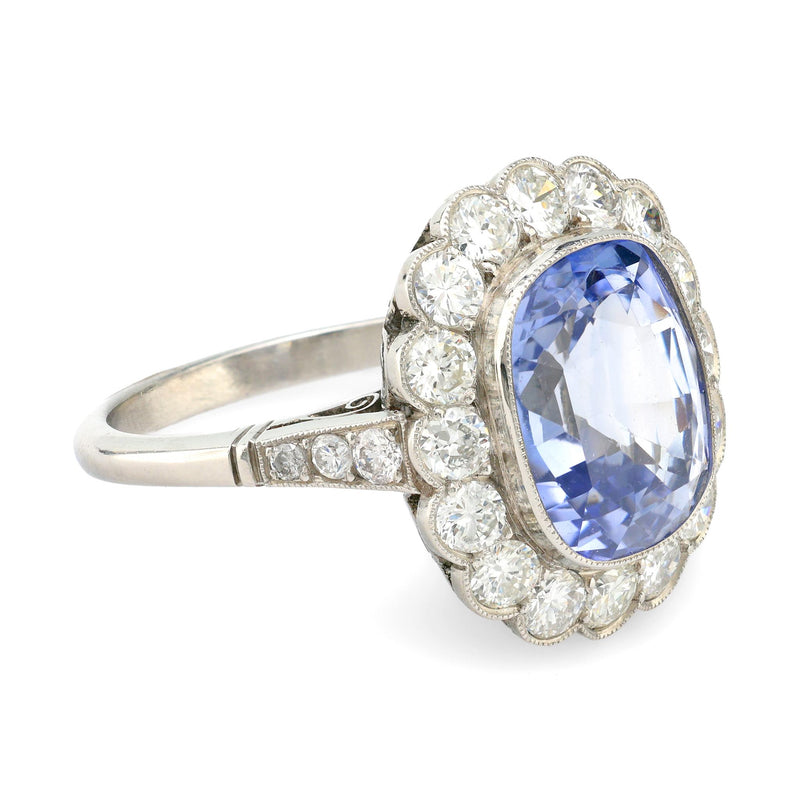 Vintage 5.70 carat sapphire diamond platinum halo ring