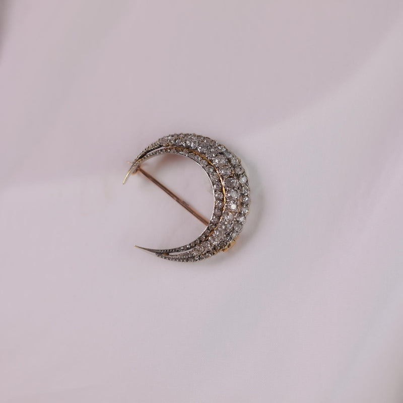 Antique diamond 18k yellow gold and silver crescent brooch