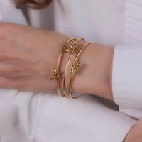 Gucci Italy 14k yellow gold set of three interlocking bangles