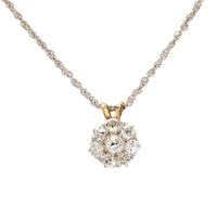 Edwardian 1.10 carat diamond 14k and platinum flower necklace