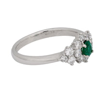 Modern emerald diamond platinum ring