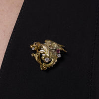 Vintage diamond ruby 10k yellow gold gryffin brooch