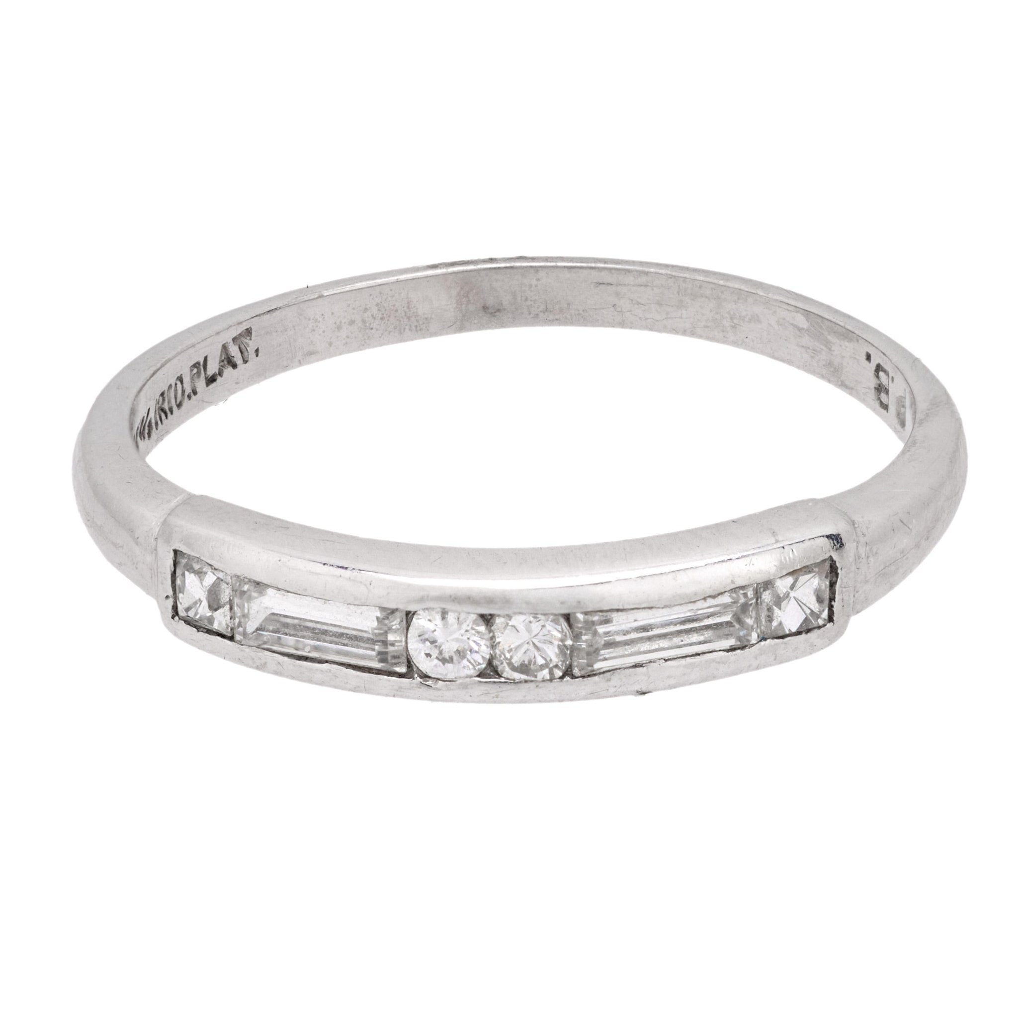 Art Deco round and baguette cut diamond platinum band