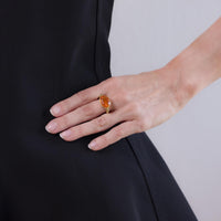 Modern 3.90 carat fire opal 18k yellow gold east-west bezel ring