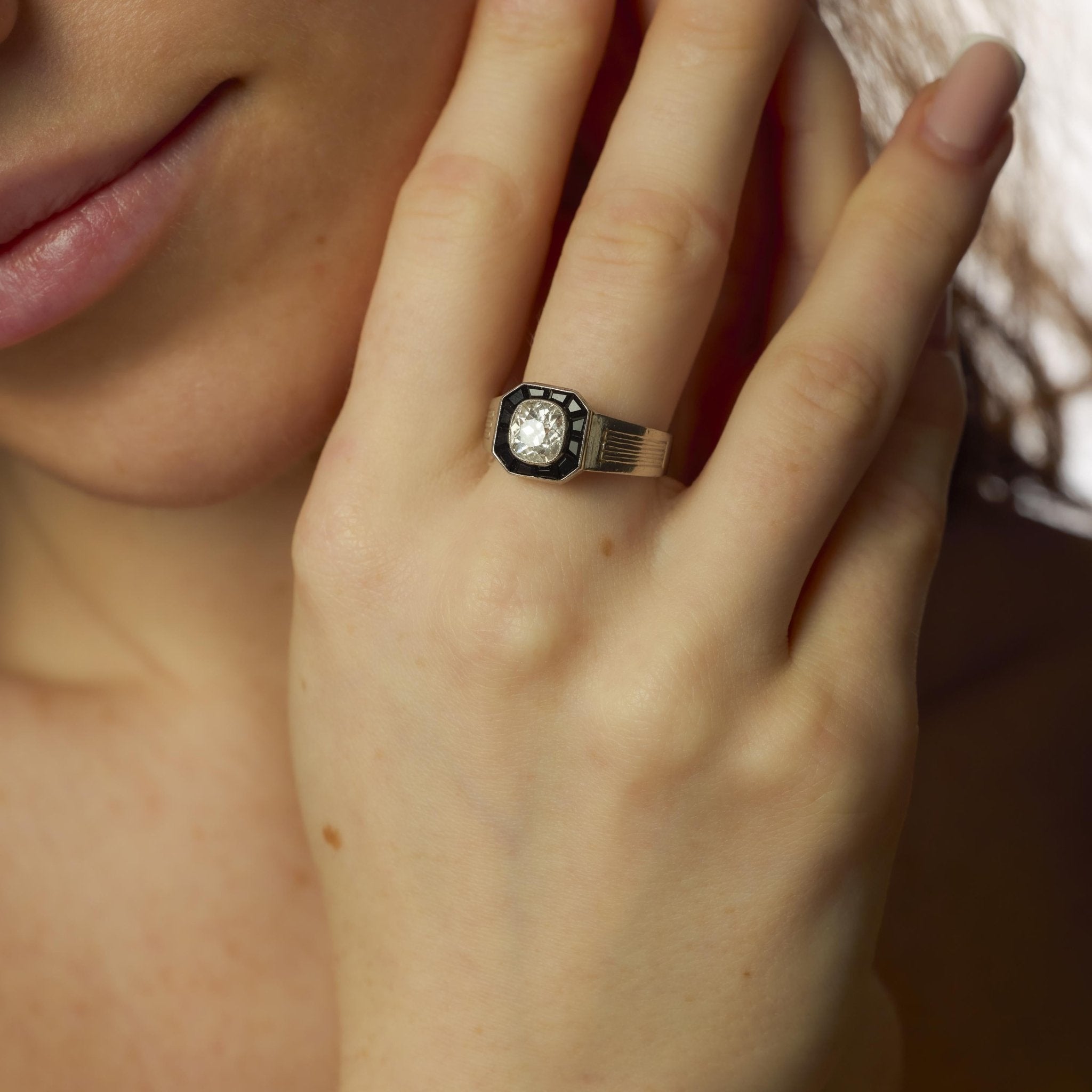 Art Deco style 1.25 carat old mine cut diamond onyx platinum engagement ring
