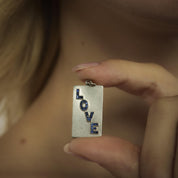 Mid Century sapphire platinum "Love" locket