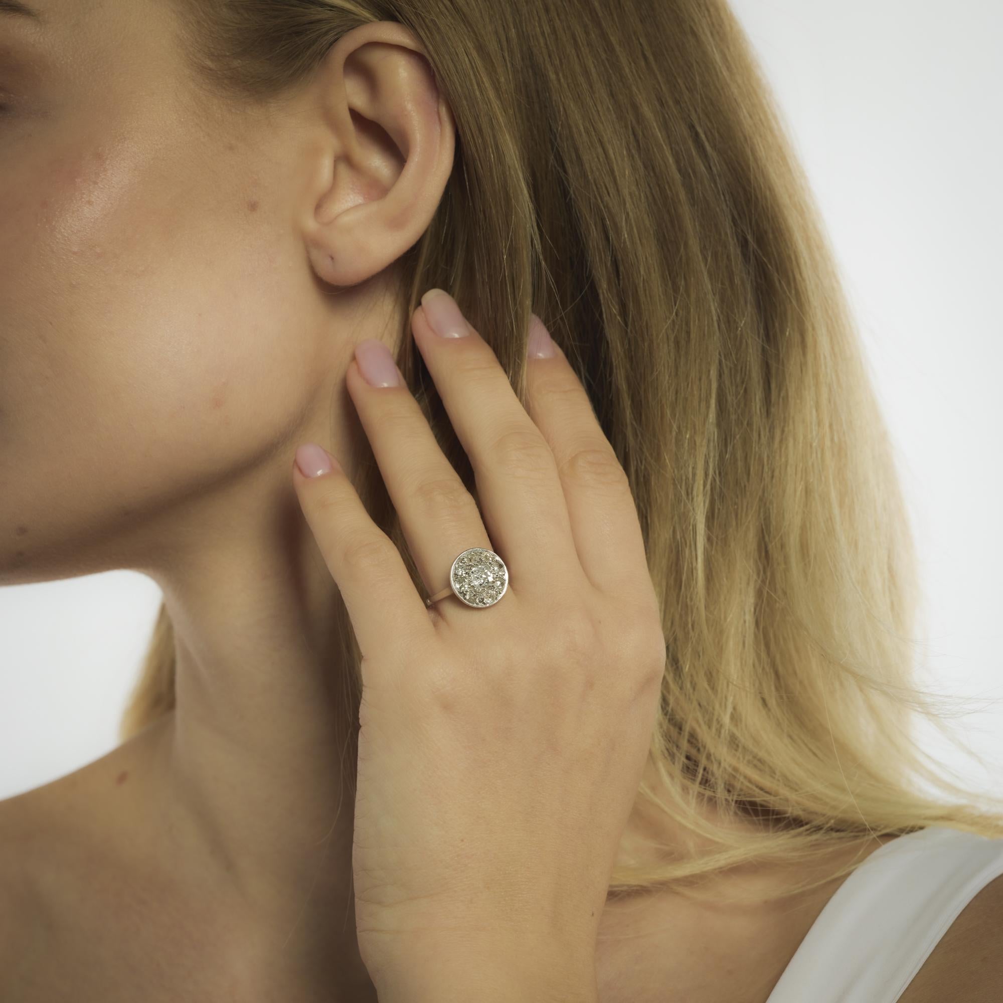 Edwardian diamond platinum cluster engagement ring