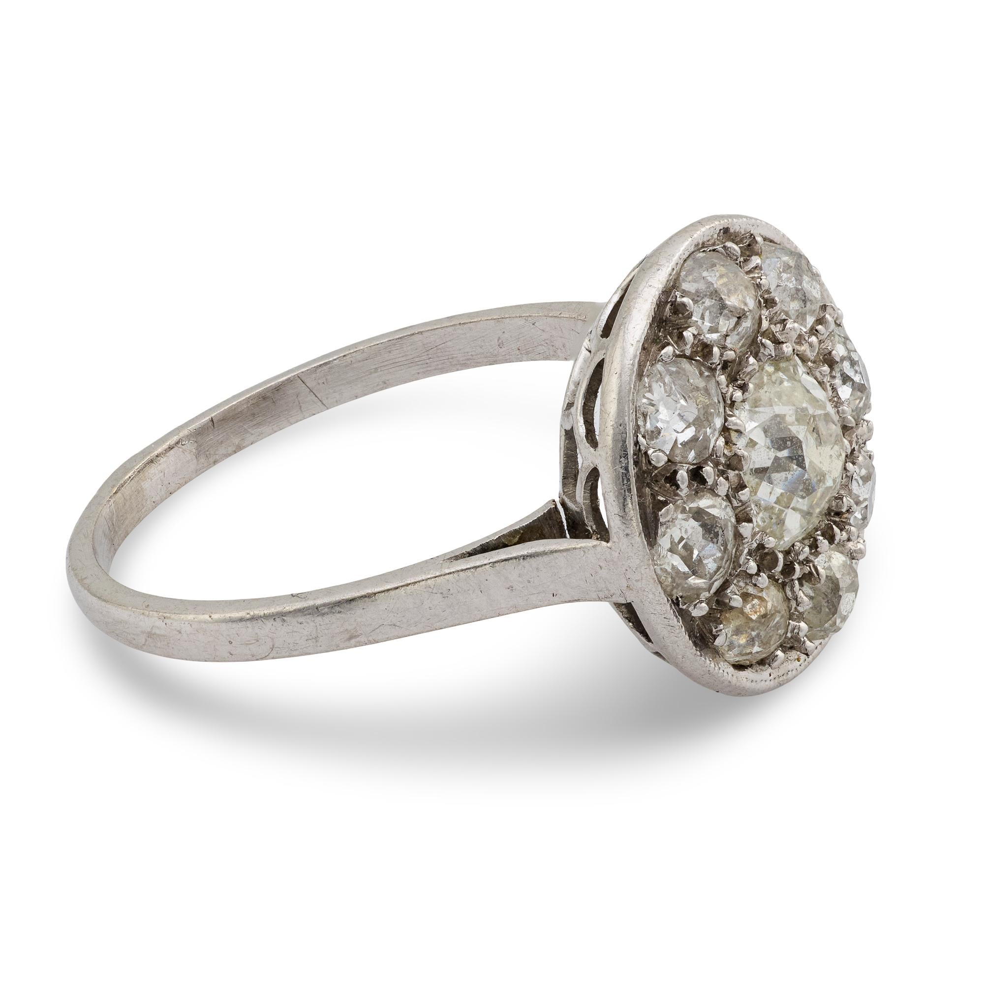 Edwardian diamond platinum cluster engagement ring