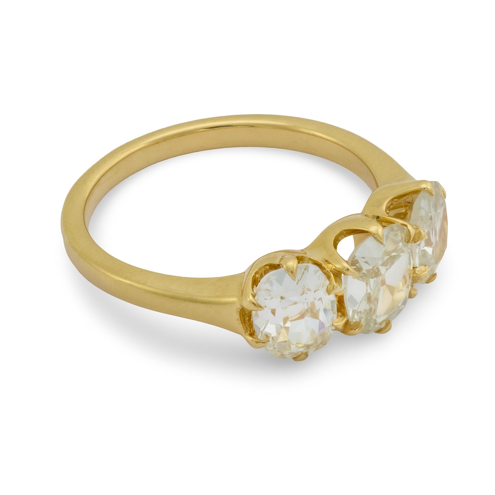 Contemporary 1.69 carat old mine cut diamond 18k yellow gold 3 stone ring