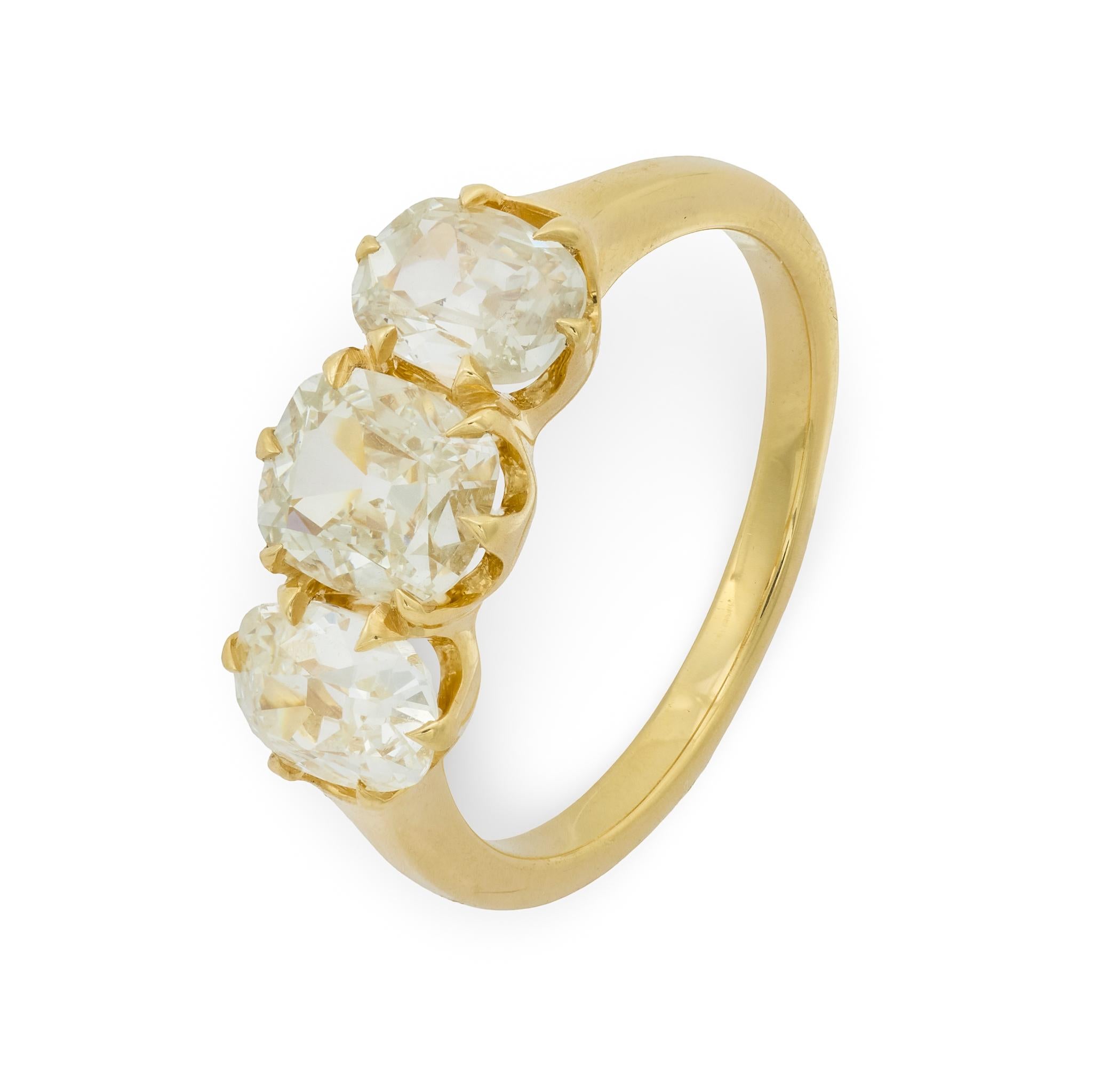Contemporary 1.69 carat old mine cut diamond 18k yellow gold 3 stone ring