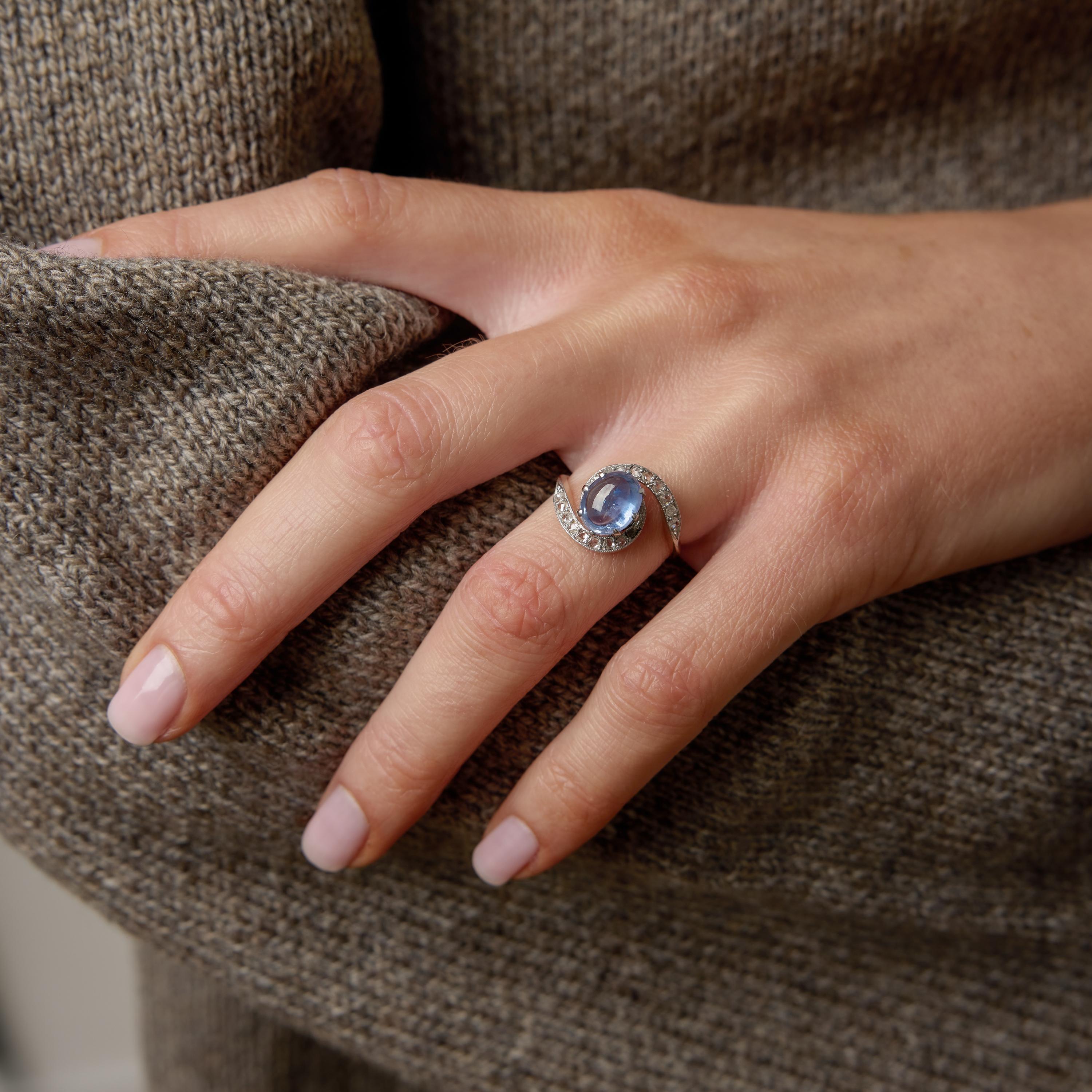 Edwardian cabochon cut sapphire 18k rose gold platinum swirl ring