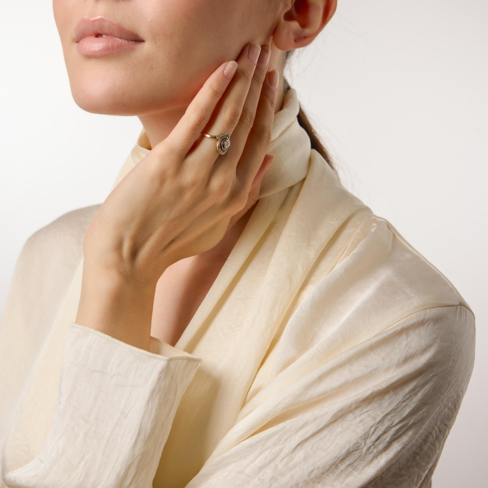 Edwardian diamond two tone 18k gold swirl ring