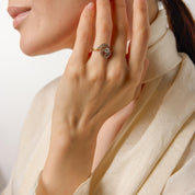 Edwardian diamond two tone 18k gold swirl ring