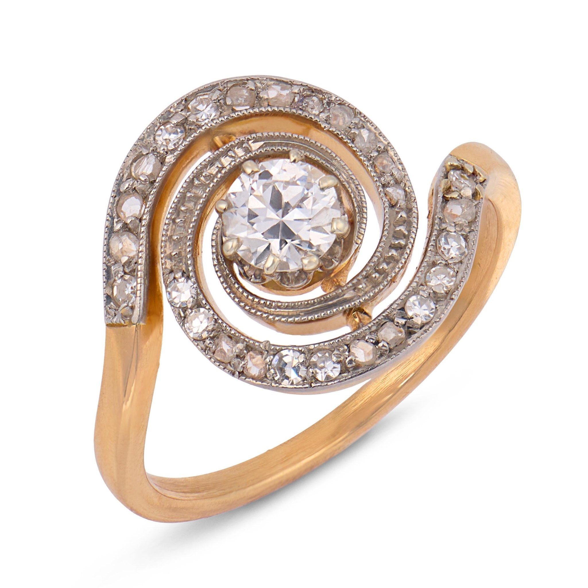Edwardian diamond two tone 18k gold swirl ring