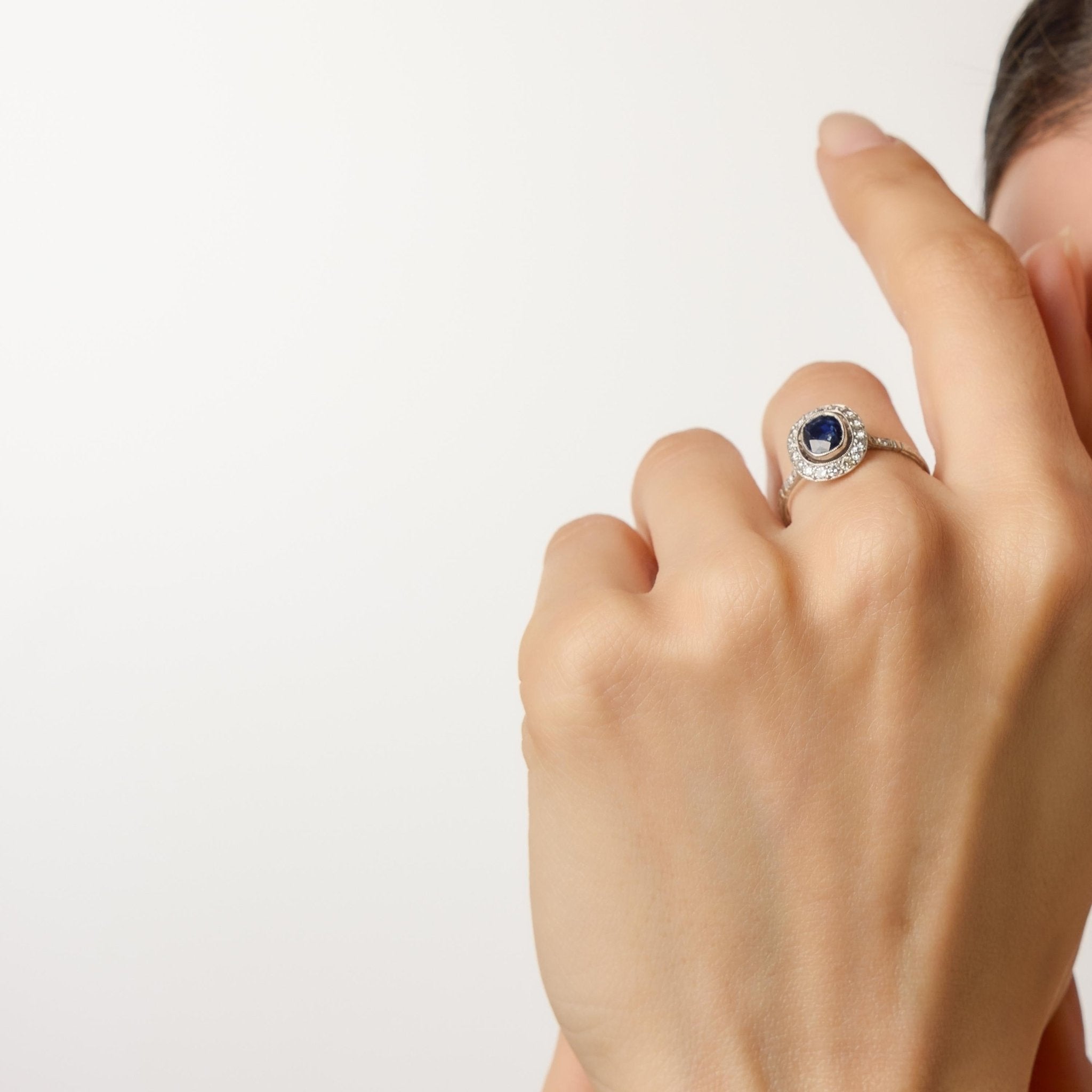 Art Deco inspired sapphire diamond cluster platinum ring