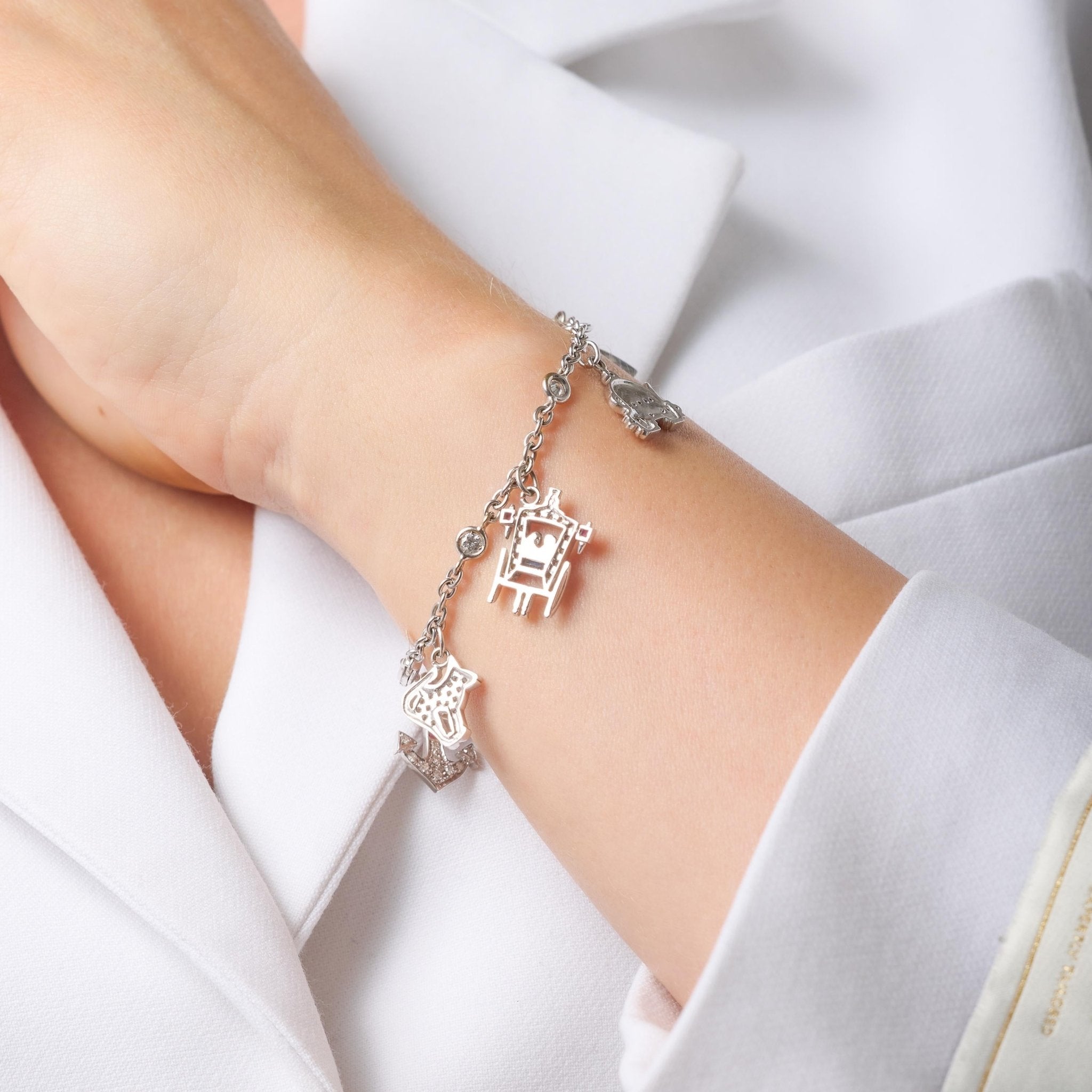 Vintage diamond ruby sapphire 18k white gold charm bracelet