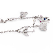 Vintage diamond ruby sapphire 18k white gold charm bracelet