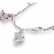 Vintage diamond ruby sapphire 18k white gold charm bracelet