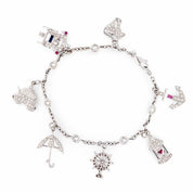Vintage diamond ruby sapphire 18k white gold charm bracelet