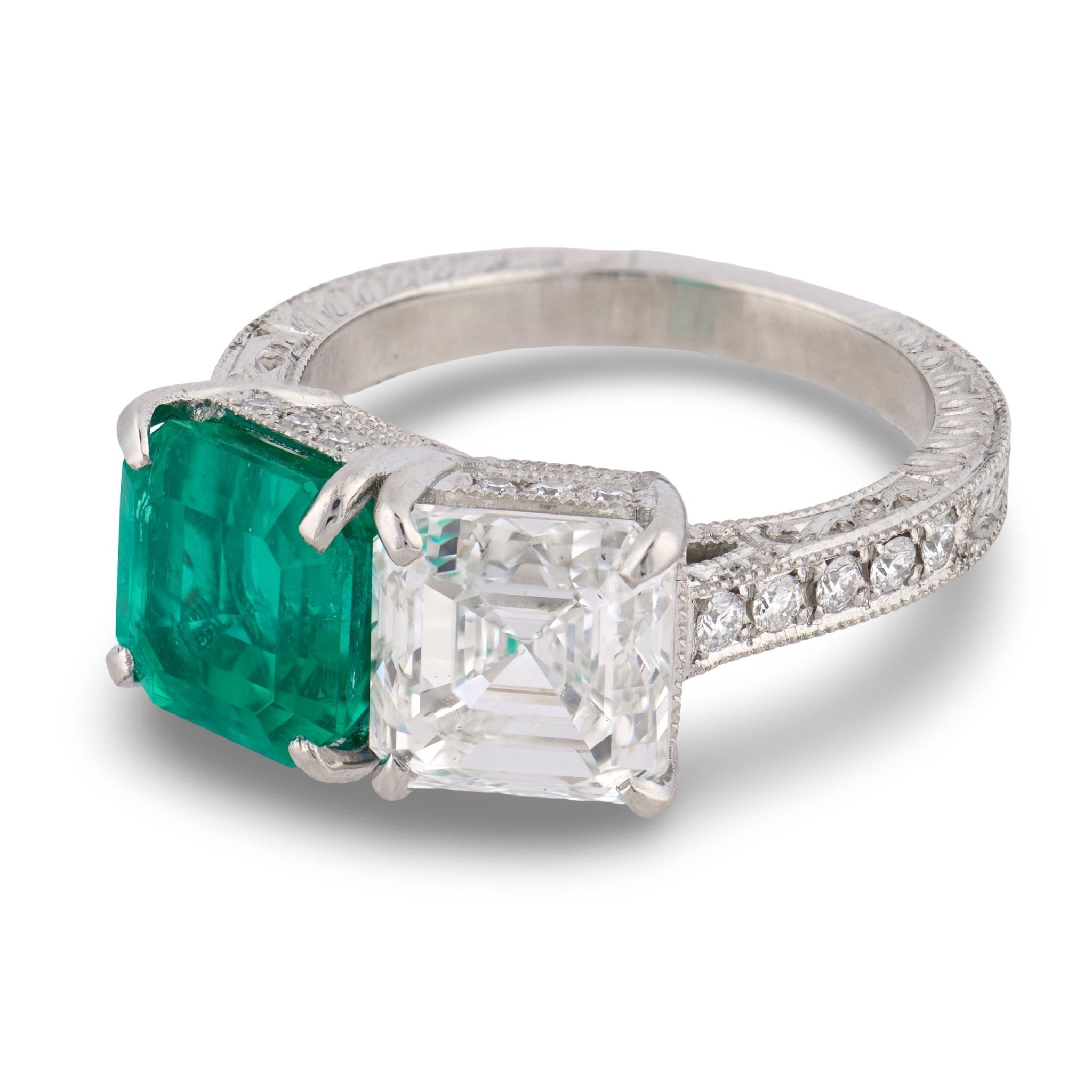 GIA 2.70 ct diamond AGL 2.58 ct Colombia No Oil emerald platinum Toi Et Moi ring