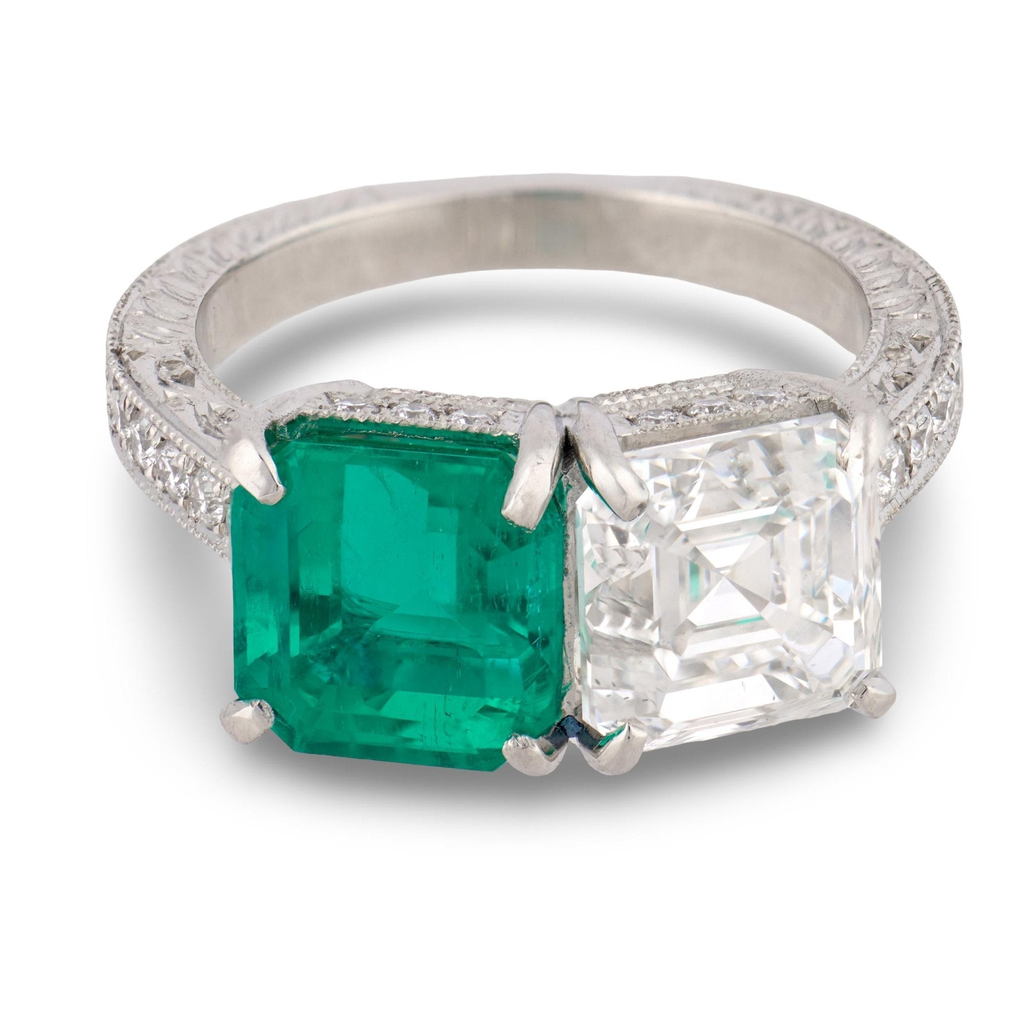 GIA 2.70 ct diamond AGL 2.58 ct Colombia No Oil emerald platinum Toi Et Moi ring