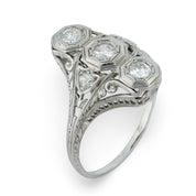 Edwardian Old European cut three stone diamond navette ring
