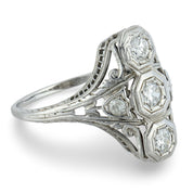 Edwardian Old European cut three stone diamond navette ring