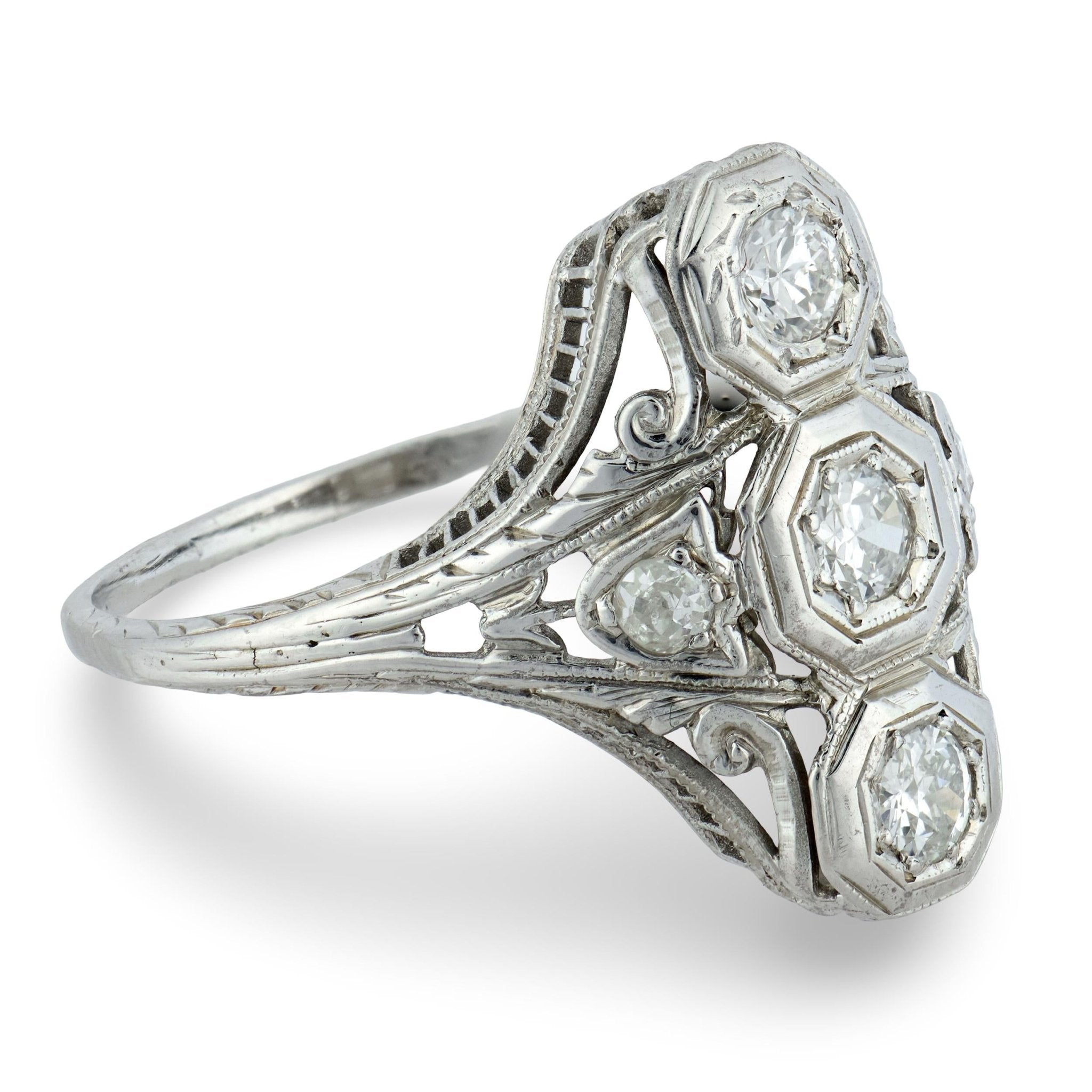 Edwardian Old European cut three stone diamond navette ring
