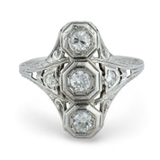Edwardian Old European cut three stone diamond navette ring