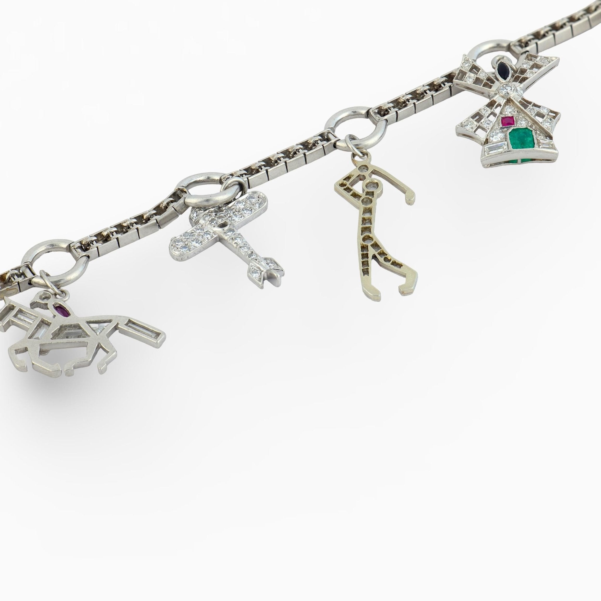 Art Deco Tiffany and Co. diamond gemstone platinum charm bracelet