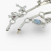 Art Deco Tiffany and Co. diamond gemstone platinum charm bracelet