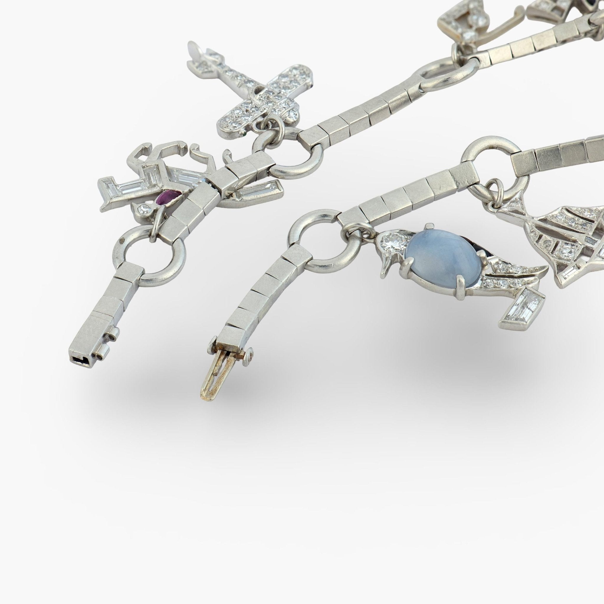 Art Deco Tiffany and Co. diamond gemstone platinum charm bracelet