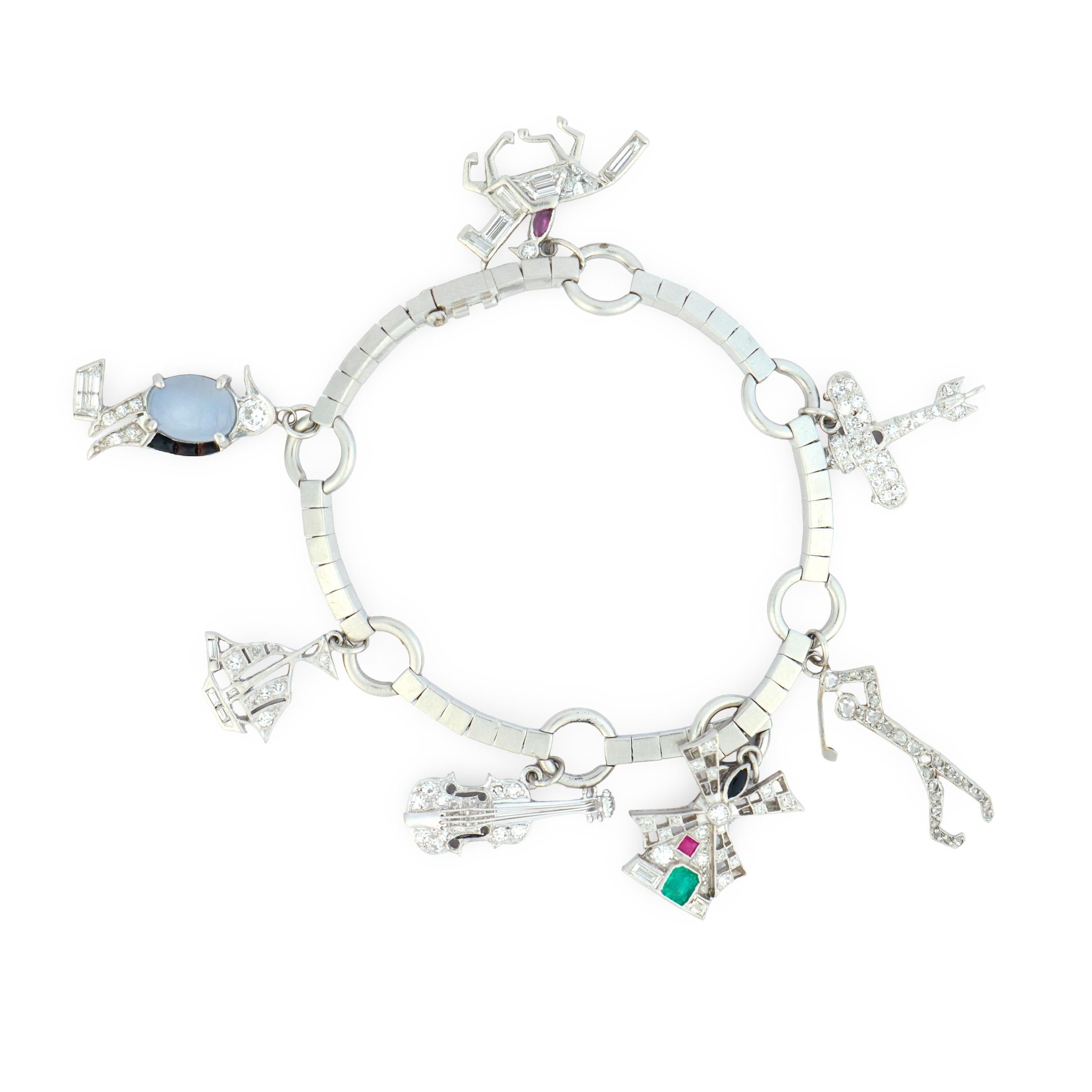 Art Deco Tiffany and Co. diamond gemstone platinum charm bracelet