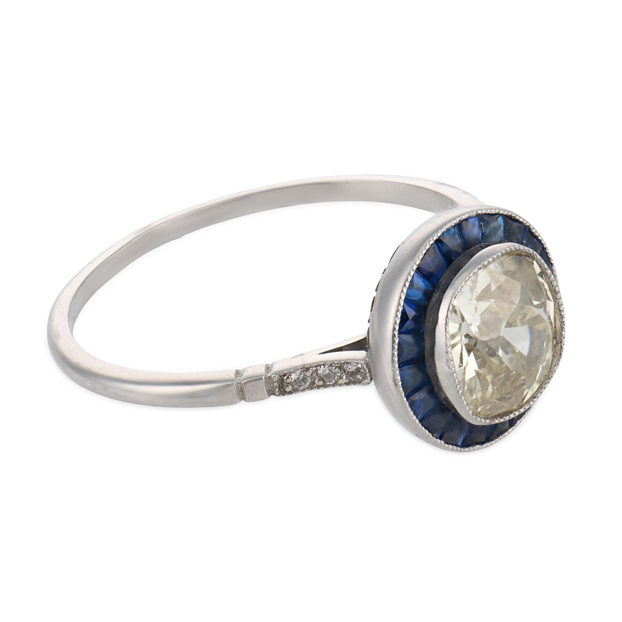 Art Deco style 1.26 carat old mine cut diamond sapphire platinum target ring