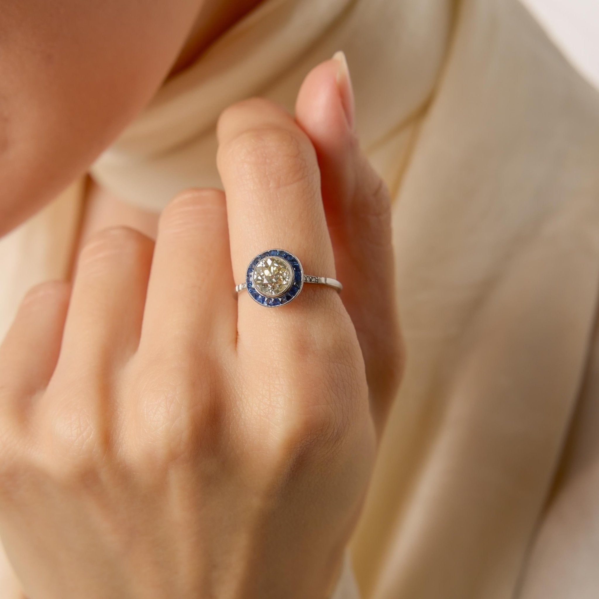 Art Deco style 1.35 carat old European cut diamond sapphire platinum target ring