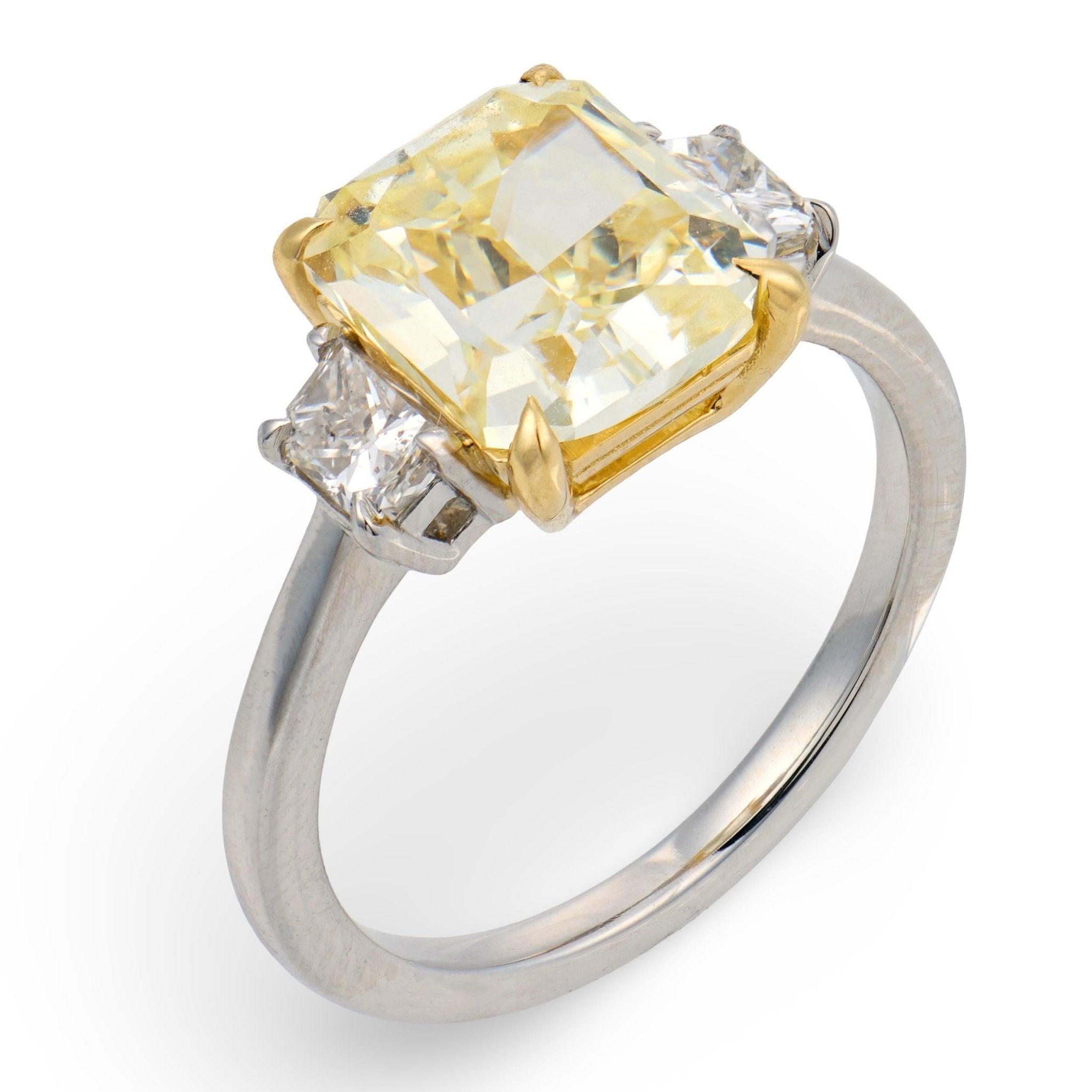 GIA 3.50 carat fancy yellow VVS1 diamond platinum engagement ring